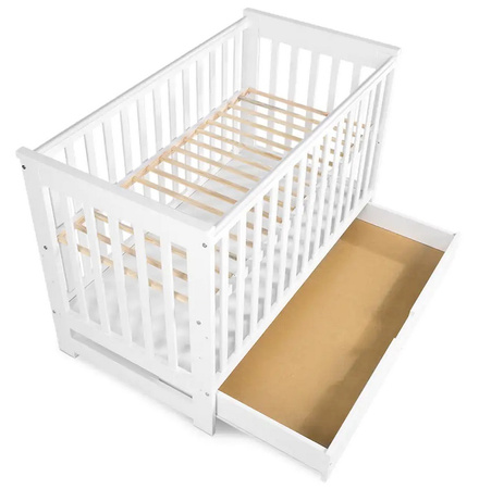 Klupś Łóżeczko IWO z szufladą i barierką ochronną białe